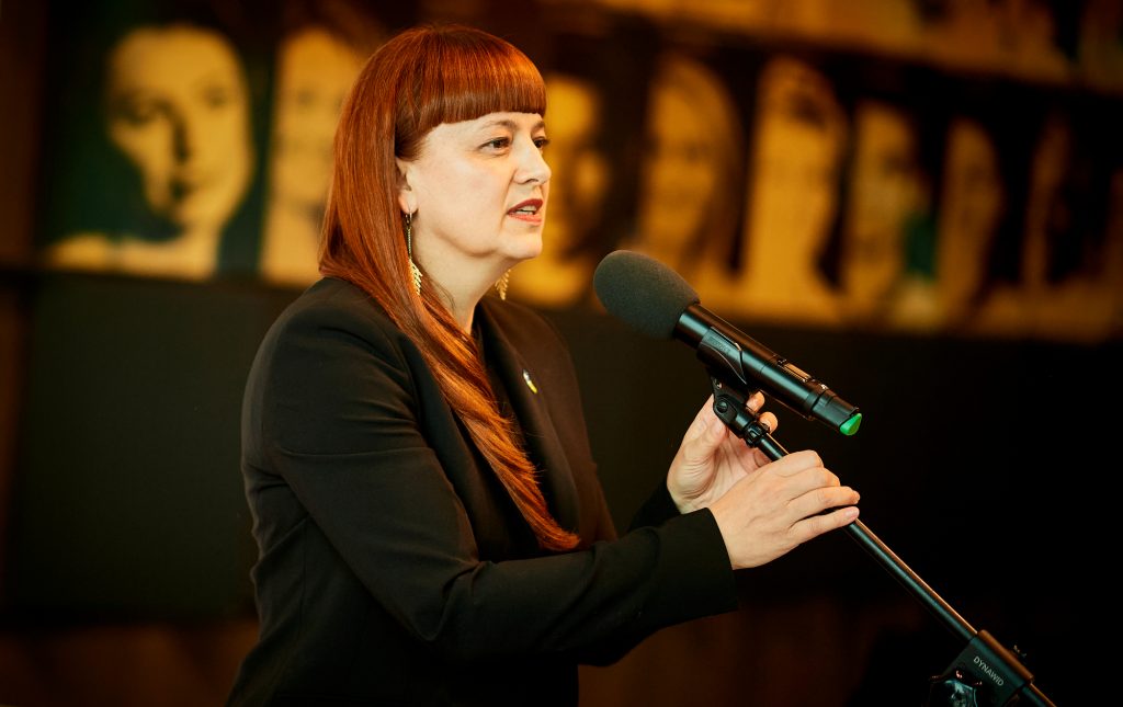 Hanna Wawrowska speaking at a Polish Olympic Committee event